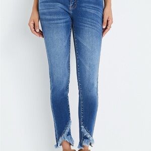 KanCan™ Skinny Mid Rise Frayed Hem Jean size 27 
Color: medium sandblast